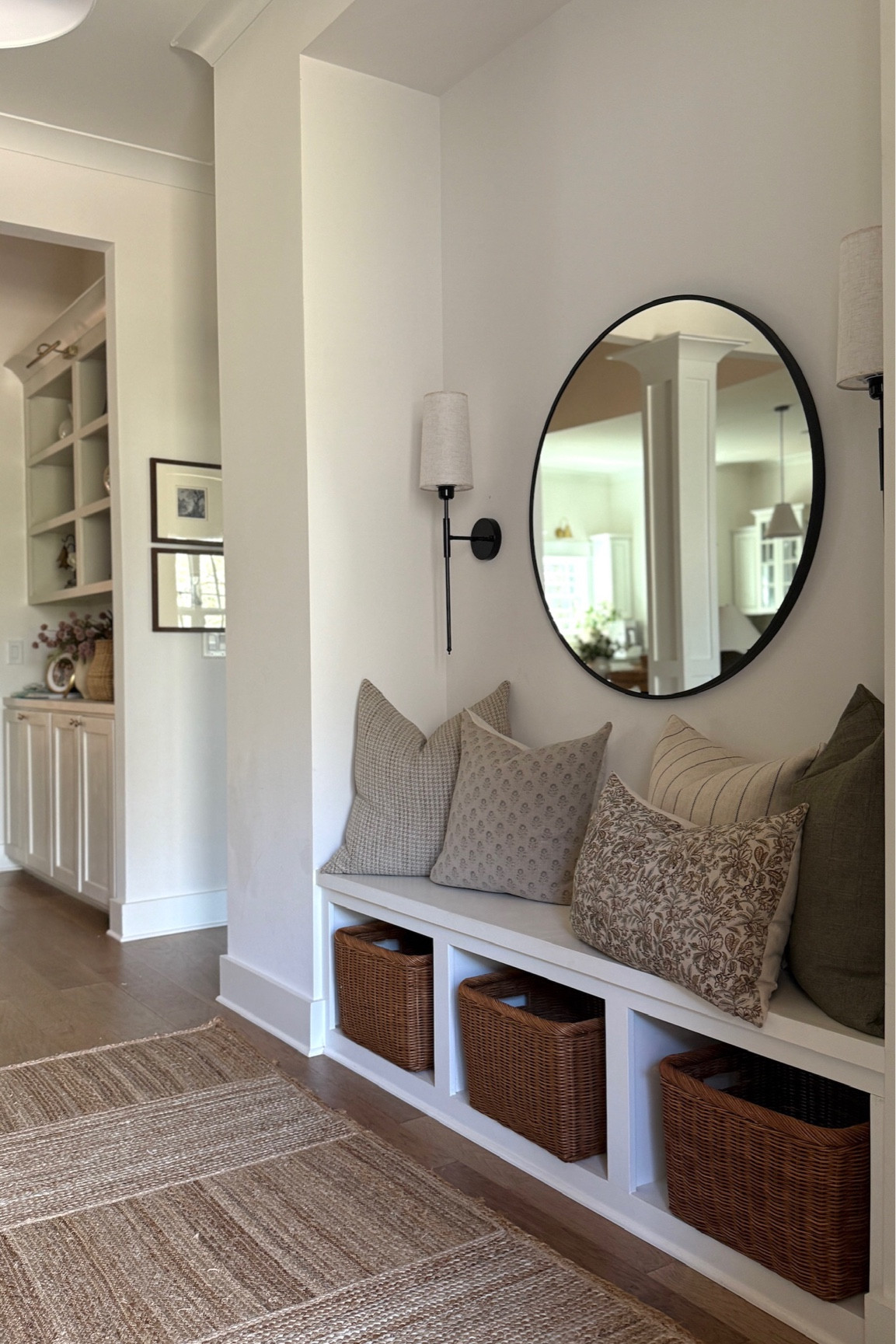 Spring entryway 🙌🏻 Love how this space came together with Hackner Home pillows, favorite Target baskets, and the best wireless scones!

#LTKHome #LTKMothersDay #LTKSeasonal