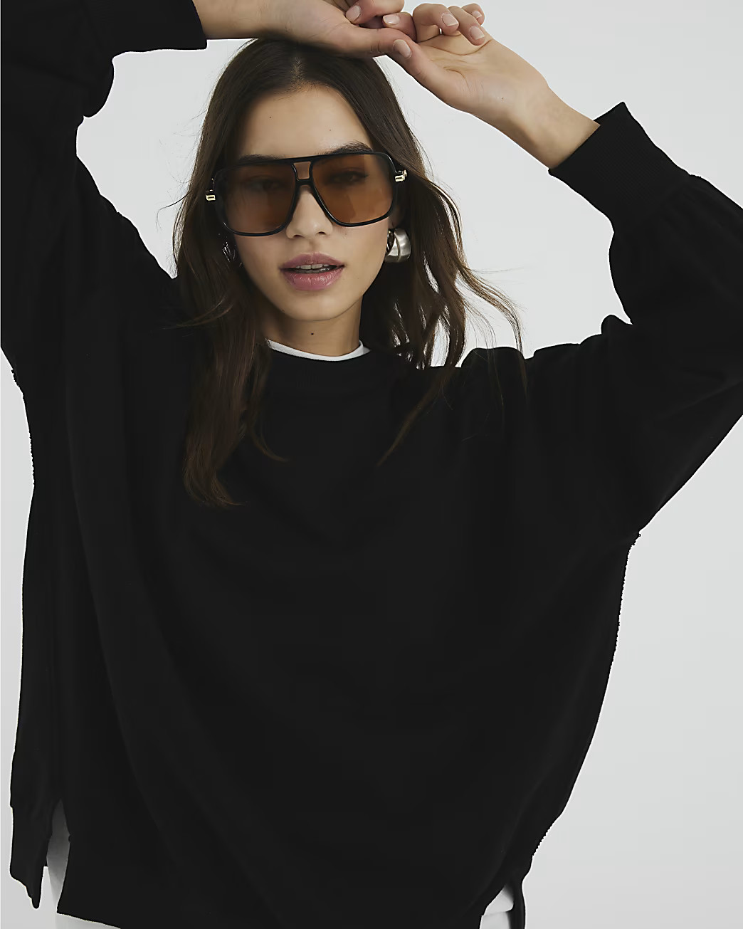 Black Elliptical Seam Sweatshirt | River Island UK & IE