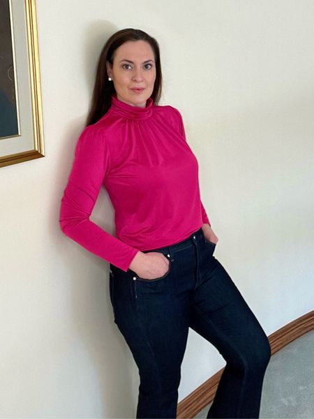 This fitted turtleneck has a little sheen/shimmer to it. The color is so pretty and can be worn on cooler days into Spring. It’s from Ann Taylor and also comes in lavender and black  Also wearing my favorite jeans from WHBM. 

#LTKstyletip #LTKover40 #LTKSeasonal
