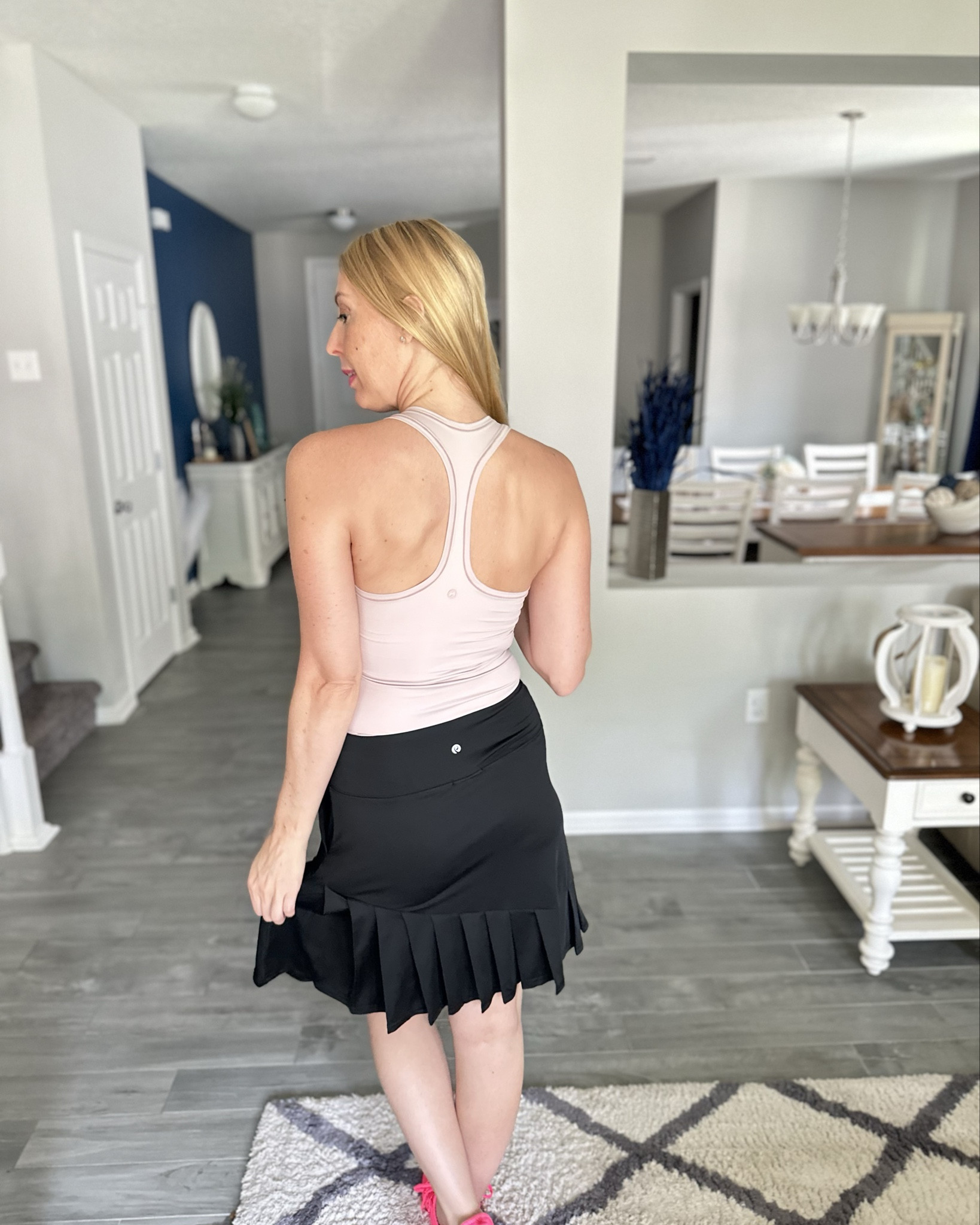 Super soft racerback tank and modest tennis skirt 
🩵 the length on this skirt is great 
💖 it has shorts attached underneath 
🤍 wearing size small in both

#LTKFitness #LTKStyleTip #LTKFindsUnder50
