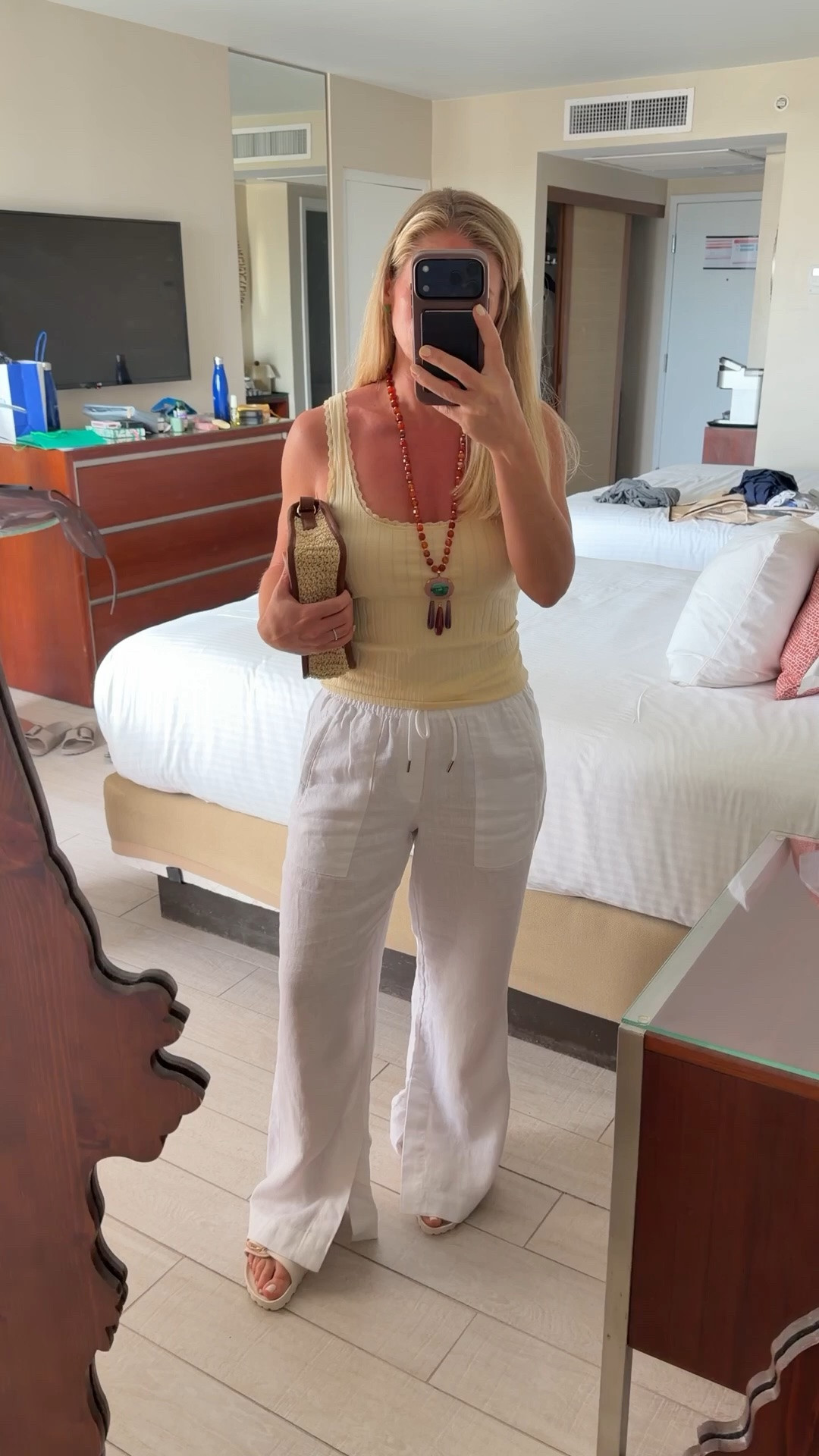 Vacation dressing is at its best when it’s simple.

A soft pointelle tank, white linen pants, comfortable sandals, and a statement necklace that does all the heavy lifting. The kind of outfit that feels polished enough for lunch, shopping, or sunset cocktails, but comfortable enough to wear all day.

Wearing an @jcrew pointelle tank, @athleta linen pants, @birkenstock Madrid sandals, the beautiful @jenniferbehr x @juliaberolzheimer necklace, and a raffia bag that completes every summer look.

Proof that a few easy pieces can create the most effortless vacation wardrobe ✨🤍🌴

#LTKTravel #LTKPetite #LTKootd