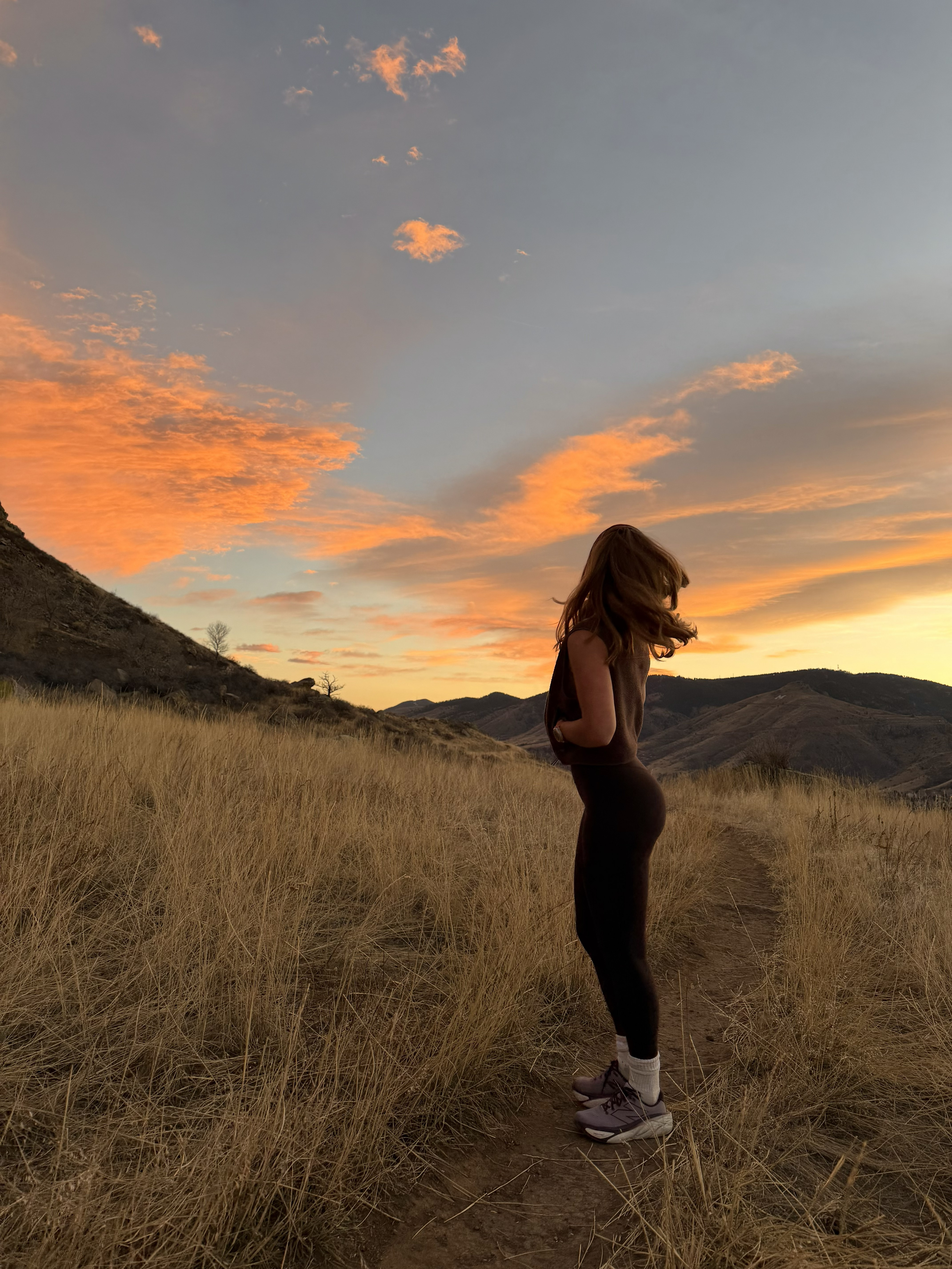 Golden hour hikes in my favorite layers. Wearing my Vuori vest, lululemon leggings, and New Balance shoes for the comfiest trail combo 🤎! 

 #LTKfitnessgoals #LTKActive #LTKTravel