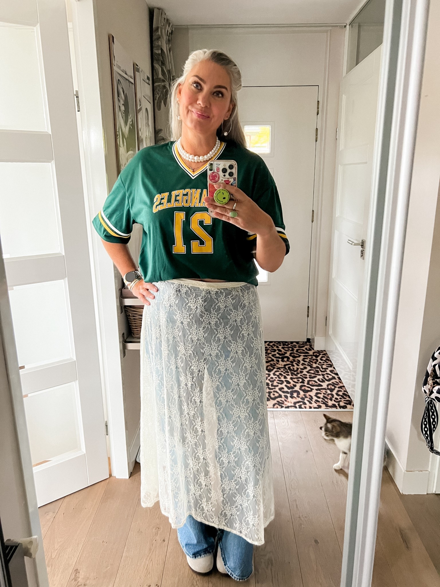 Ootd - Tuesday. Green football top (L) paired with pearl necklaces, Levi’s ribcage flare jeans (32/34) a lace skirt (L) and Birckenstock Boston slippers. 



#LTKnederlands #LTKspring #LTKeurope