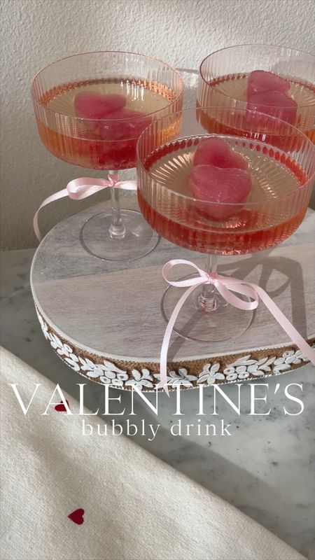 PARTY \ Valentine’s bubbly drink with all the cayuuuuuteness: silk ribbon bow and heart shaped ice cubes❤️🎀🍾

Valentine’s Day
Amazon 
Bar


#LTKVideo #LTKhome #LTKparties