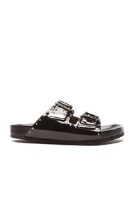 GIVENCHY Swiss Studs Patent Leather Sandals in Black | FWRD 