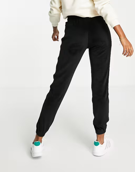 adidas Originals 'Relaxed Risque' velour joggers in black | ASOS (Global)