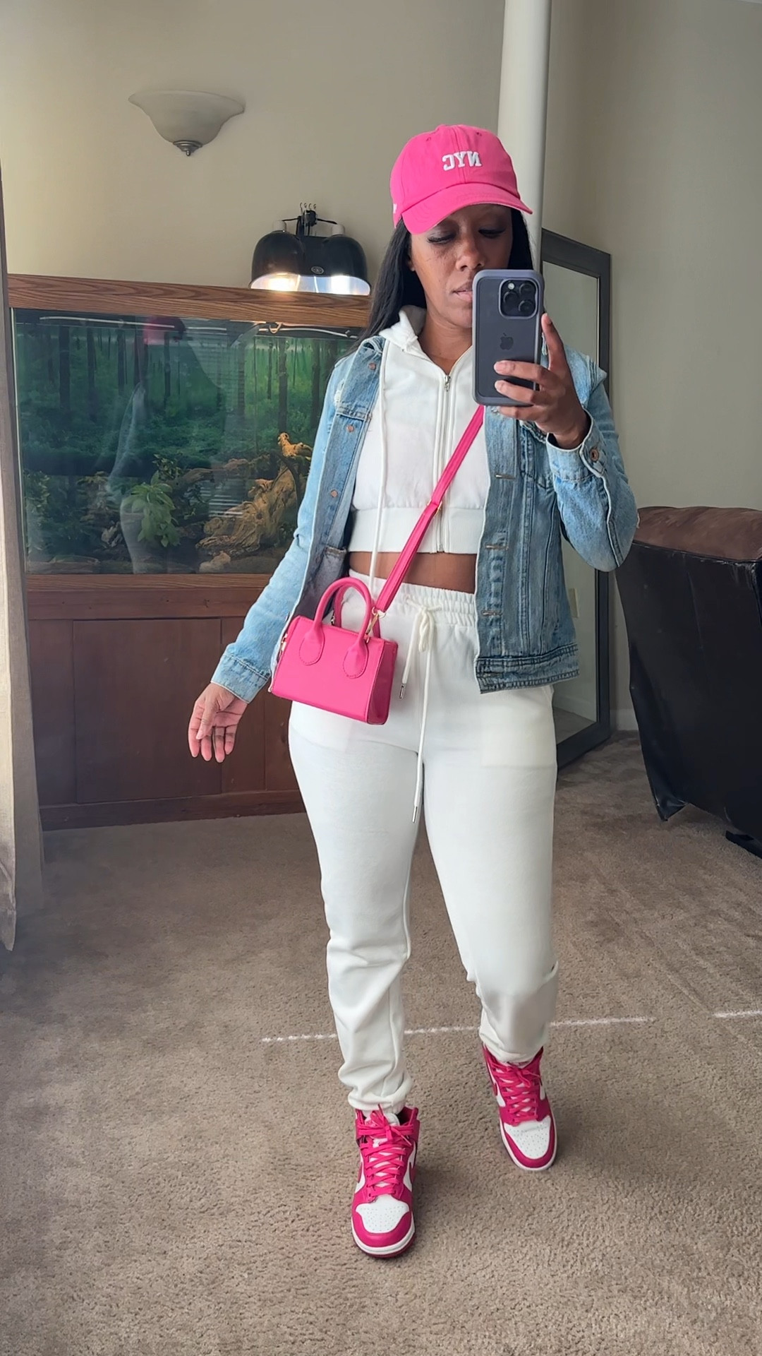 Valentine outfit idea for women who wear sneakers! I’m wearing a two piece jogger set in a size Xsmall. I layered it with a denim jacket. For an added pop of color, I put on a hot pink NY hat, crossbody bag, and sneakers

#LTKstyletip #LTKMostLoved #LTKshoecrush