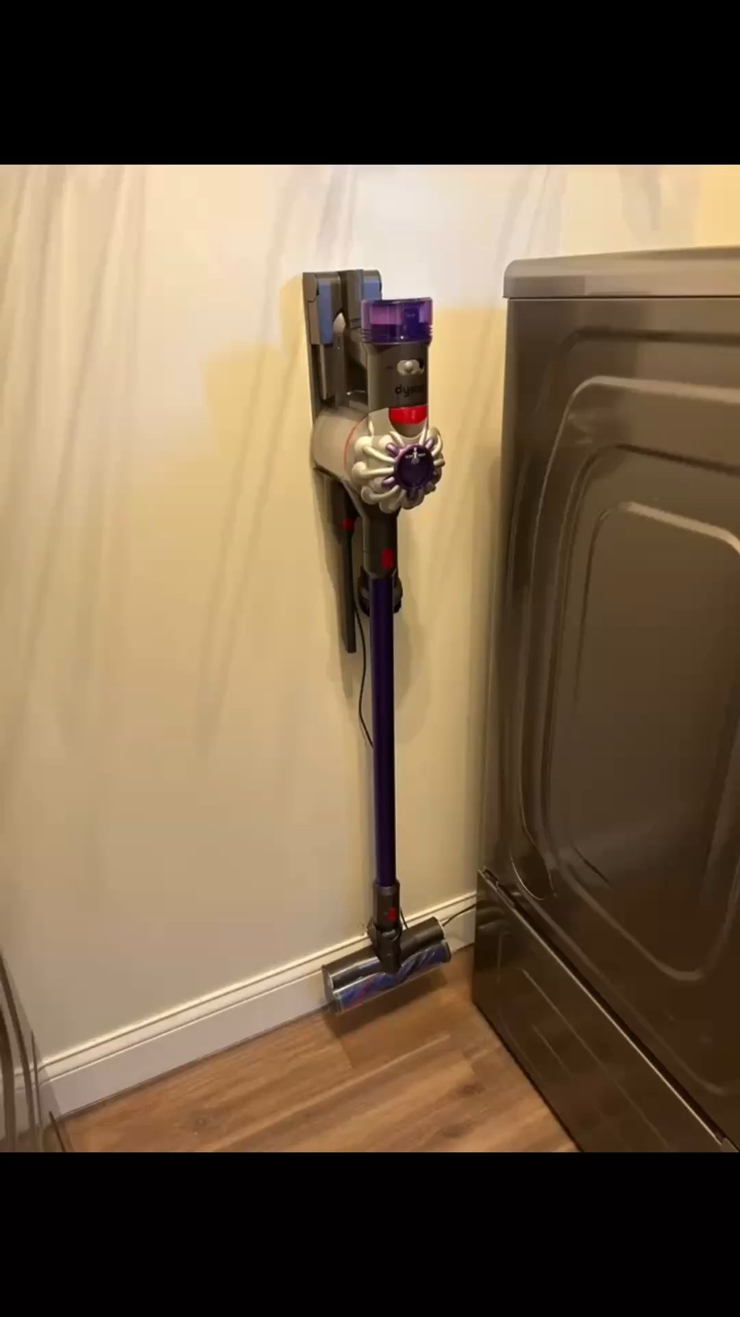 The Dyson handheld stick vacuums are so popular because they are wonderful. They just charge on the wall, you can grab them and vacuum hardwood, laminate, rugs, and carpets. I didn’t even videotape the best feature, which is it can become a small handheld vacuum. There is now a V 11 which is even more improved! A great time to grab one is during these big deal weeks!! 

#LTKFamily #LTKHome #LTKSaleAlert