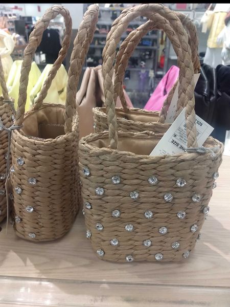 How cute is this mini straw bucket bag?  Only $25.

#LTKSeasonal #LTKfindsunder50 #LTKitbag