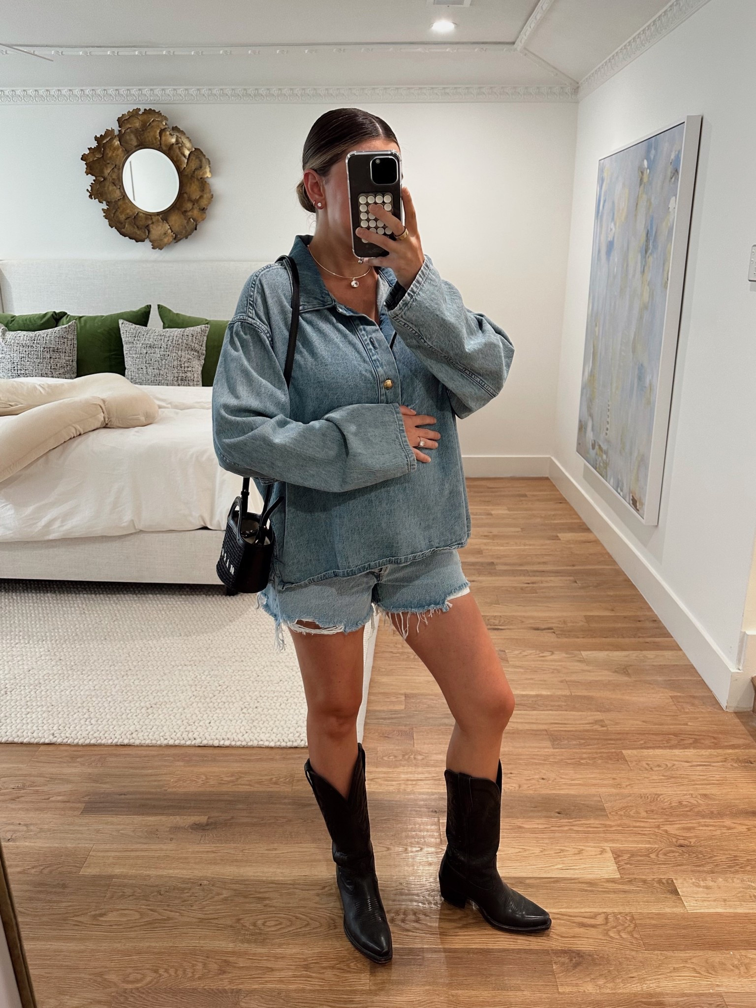 Denim on denim outfit with black cowboy boots. This western be a cute country concert outfit 

#LTKBump #LTKFindsUnder100 #LTKStyleTip