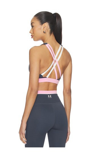 P.E Nation Lumify Sports Bra in Slate,Pink. - size M | Revolve Clothing (Global)