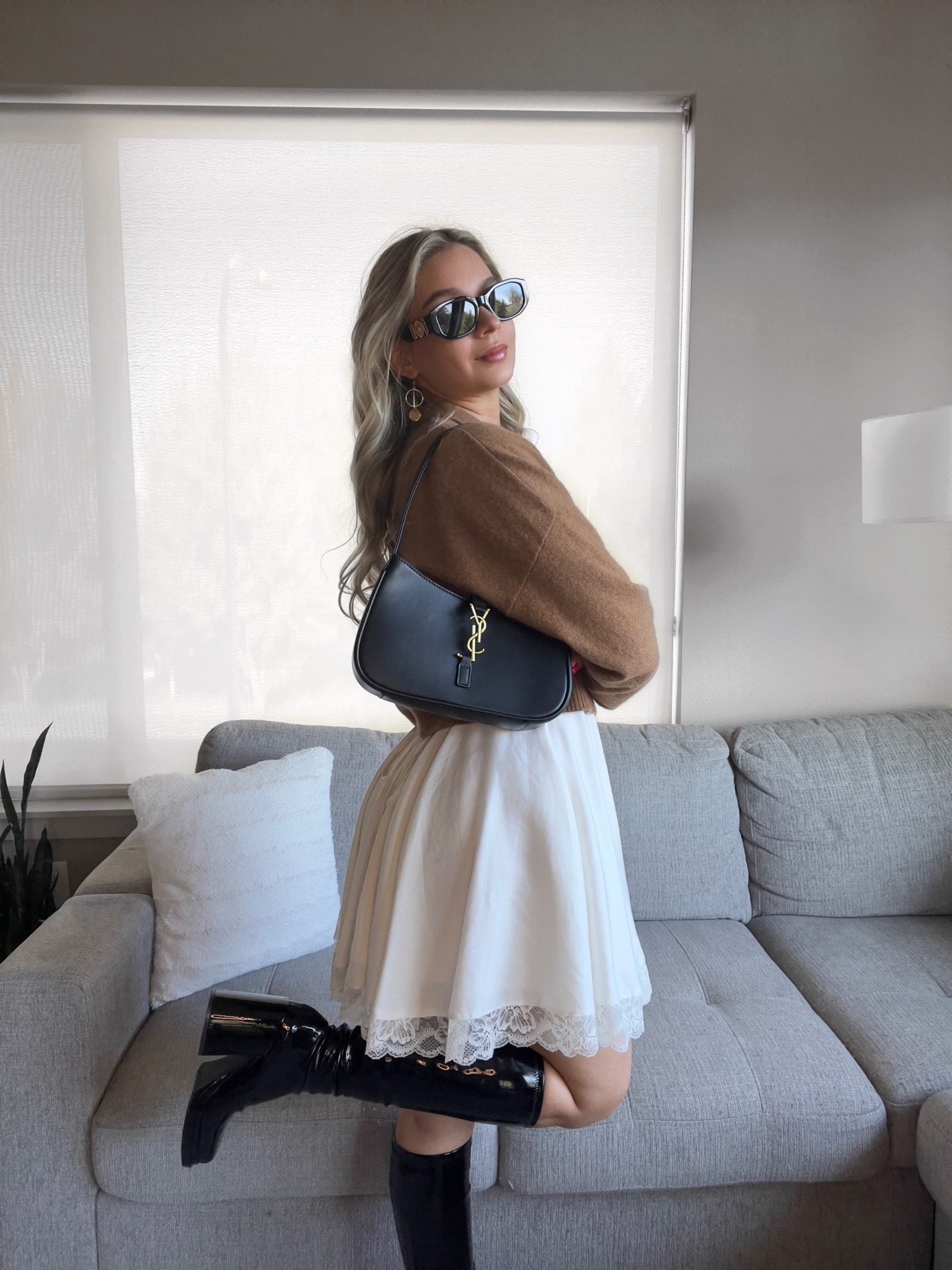 How to wear your summer dresses this season! 🍂 Add a warm tone cashmere sweater. There are no links for the one I am wearing. But your can find second hand with the name “reformation cashmere cropped polo sweater” The white dress is houseofcb and the black boots are Steve Madden object tall boot. 

#LTKU #LTKGiftGuide #LTKSeasonal