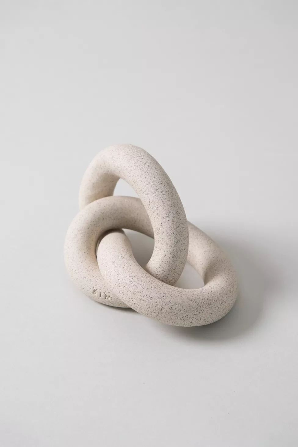 SIN Ceramic Infinity Knot | Urban Outfitters (US and RoW)