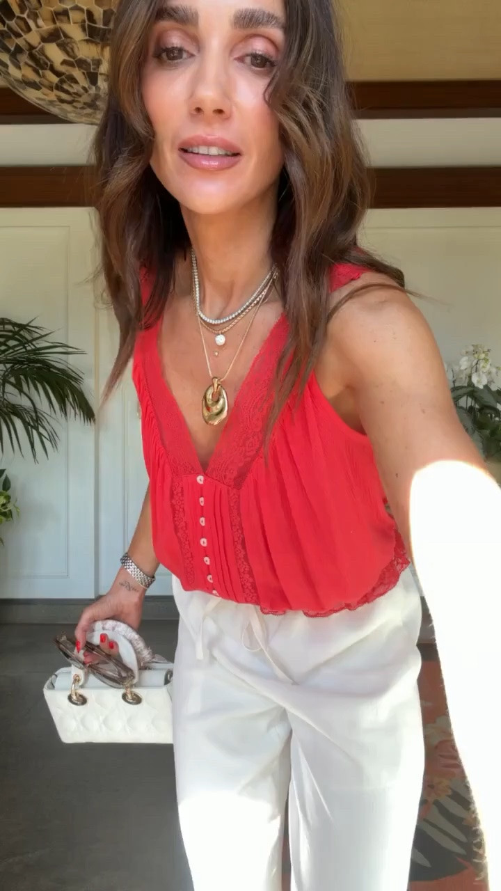 This red tank and white pants combo is such a fun summer outfit. The pop of color paired with classic white bottoms creates a look that feels fresh for everything from lunch dates to weekend plans.

Red tank, white pants, summer outfit, colorful style, casual chic, warm weather look, vacation outfit, everyday fashion, classic pieces, date night outfit, summer wardrobe, annabrstyle

#LTKootd #LTKOver40 #LTKTravel