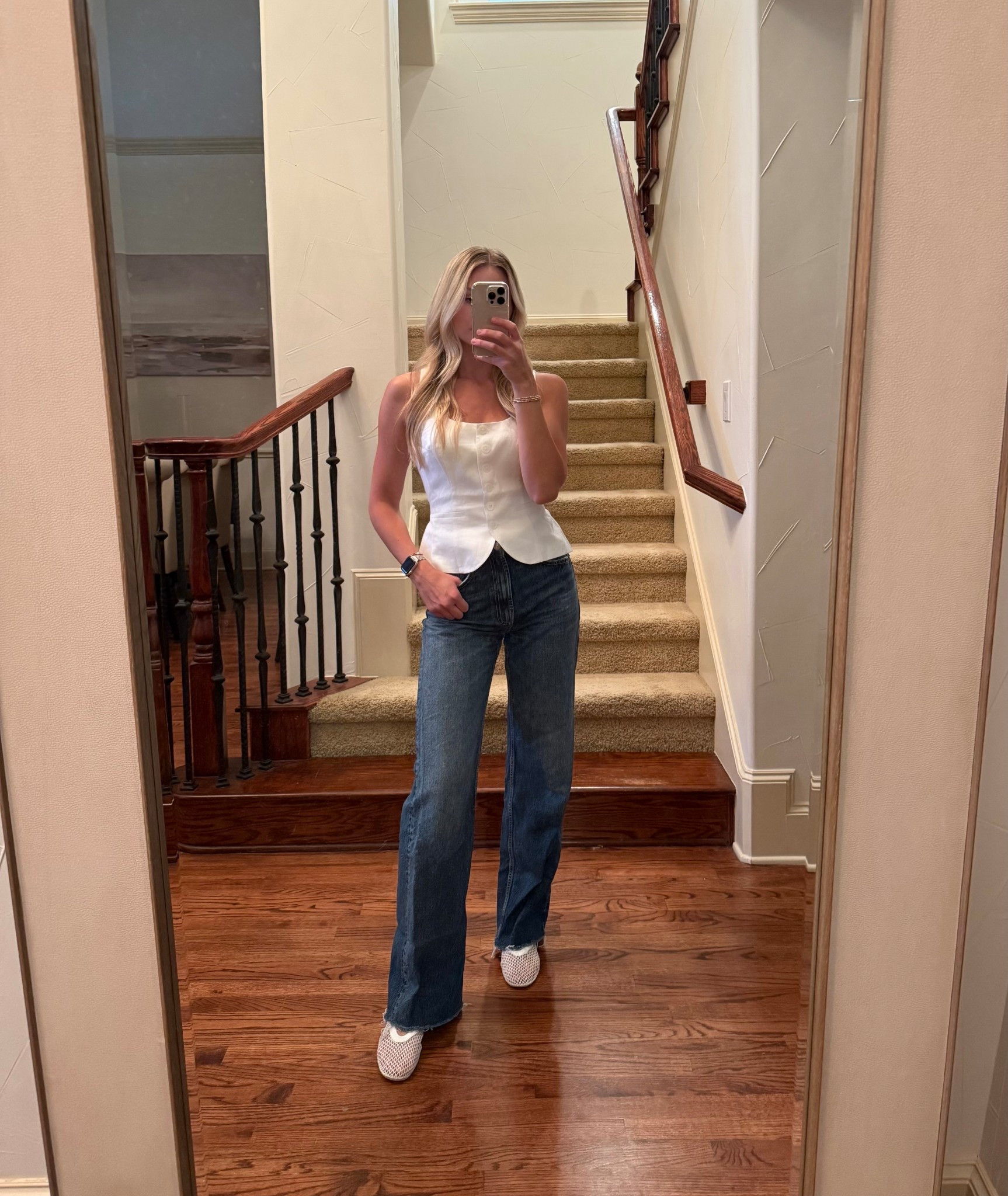Size 4 in vest and jeans are from Zara size 26