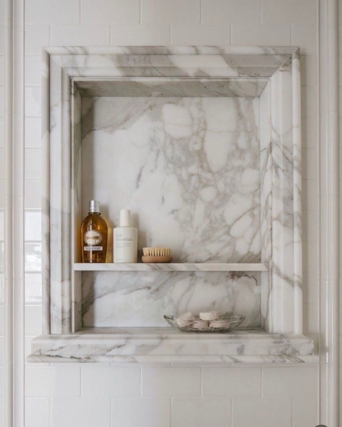 Babe this marble tile niche detail is EVERYTHING 🤍🚿✨ it’s the kind of finish that makes your bathroom look custom, polished, and straight out of a luxury spa

It’s not just storage… it’s a design moment. Your products become part of the aesthetic and your whole shower feels intentional, elevated, and complete 🕯️💫

These are the details that take a home from basic to stunning and once you have it you’ll wonder how you ever lived without it 😍

#BathroomInspo #LuxuryForLess #HomeDetails 

#LTKHome #LTKSaleAlert #LTKOver40