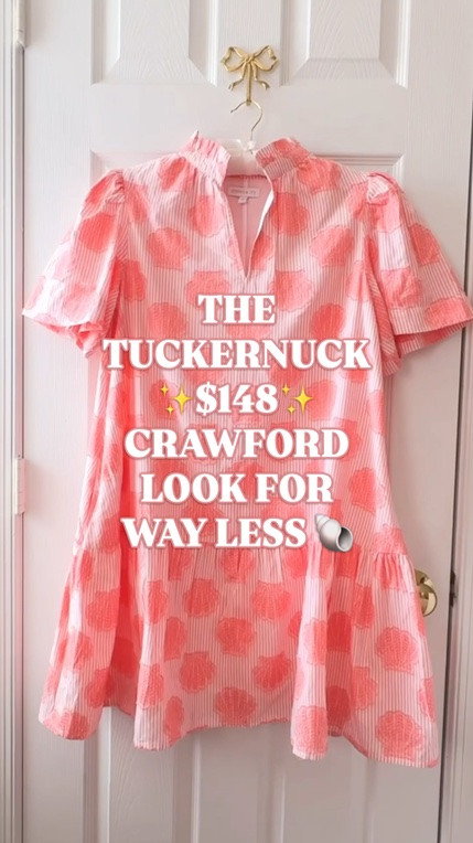 Tuckernuck Crawford dress look for less | pink summer dress | cotton mini dress | Belk doorbuster dress | designer look for less

This Belk dress has the same easy silhouette as the $148 Tuckernuck Crawford dress, and it is 60% off right now.

The pink stripe, shell-inspired print, split neckline, short sleeves, A-line mini shape, pockets, and lined 100% cotton fabric make it such a strong Tuckernuck look for less. It has that polished coastal summer feel women love from Tuckernuck, Palm Beach style, resort dresses, and preppy vacation outfits, but at a much better price.

This is the kind of dress that works for brunch, church, bridal showers, baby showers, graduation parties, beach trips, resort lunches, summer dinners, garden parties, vacation shopping, Memorial Day weekend, Fourth of July plans, and casual wedding guest dress moments.

The print feels cheerful and coastal, the cotton makes it breathable for warm weather, and the silhouette is easy to style with gold sandals, raffia wedges, pearl earrings, a straw tote, flat sandals, or a white denim jacket.

If you are searching for the Tuckernuck Crawford dress look for less, Tuckernuck inspired dress, pink summer dress, cotton mini dress, shell print dress, coastal dress, preppy summer dress, designer look for less, or expensive looking dress under $50, this is one of the best Belk sale finds right now.

Tuckernuck Crawford dress look for less, Tuckernuck Crawford dress, Tuckernuck inspired dress, Tuckernuck look for less, designer look for less, Belk dress, Crown and Ivy dress, Belk doorbuster dress, pink striped dress, shell print dress, seashell dress, cotton mini dress, 100 cotton dress, preppy summer dress, coastal dress, resort dress, vacation dress, bridal shower dress, baby shower dress, graduation dress, wedding guest dress, summer dress women

#LTKFindsUnder50 #Tuckernuck #LookForLess #VacationOutfit #SummerDress #PreppyStyle

#LTKWedding #LTKWorkwear #LTKTravel