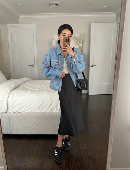 Petite friendly spring casual outfit

• Levi’s 90’s trucker jacket xxs in the wash “magic beans” - I’m wearing the 90’s oversized fit style, but also linked the original under similar for those who like a classic fit. 

• Aritzia tank top xxs

• Amazon “the drop” slip skirt xxs 

• YSL Solferino small bag 

• Adidas sambas men’s 4 = womens 5/5.5

#petite spring outfits 

#LTKSeasonal