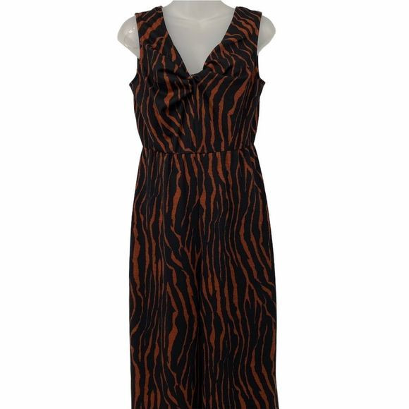 Charming Charlie Black & Brown Tiger Jumpsuit | Poshmark