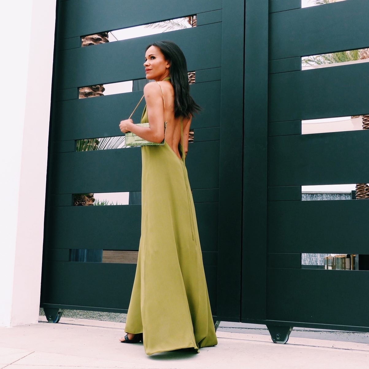 Open backs in the fall are a-ok if you live in Southern California. I love the ease of this dress, the way it flows and the pretty green color. Here are more maxi dresses to help you get the look. Oh! Let’s not forget the accessory! My clutch is vintage Max Mara. 💚

#LTKTravel #LTKSeasonal #LTKStyleTip