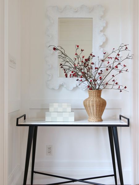 My original entryway console table. Unfortunately the table and vase are no longer available. 
The scalloped mirror is from Ballard Designs and the resin boxes from Target

#LTKhome #LTKFind #LTKstyletip