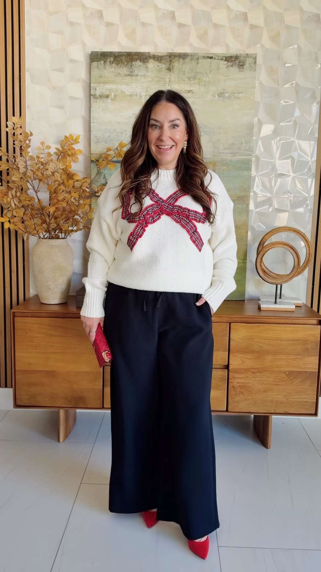The holiday sweater everyone's about to want, styled two dressy ways 🎄 Elevated with pull-on crepe pants, then festive with a red skirt — both party-ready. This one's going to sell out fast, so snag it now for everything on the December calendar.

Sizing: Sweater, L | Skirt, L | pants L
Short