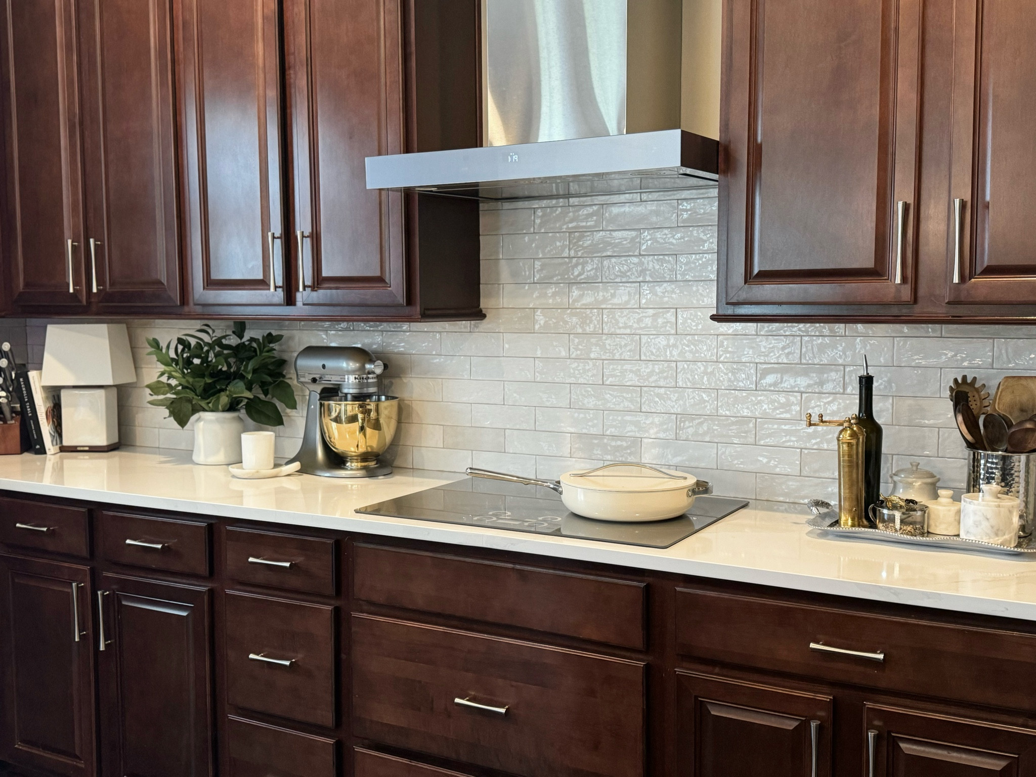 Still can’t get over this tile in my kitchen! 
I get asked about it all of the time. It’s slightly varied with off-white, creamy white and light tan. It compliments Et. Calcutta Gold Silestone quartz very well!

#LTKStyleTip #LTKHome
