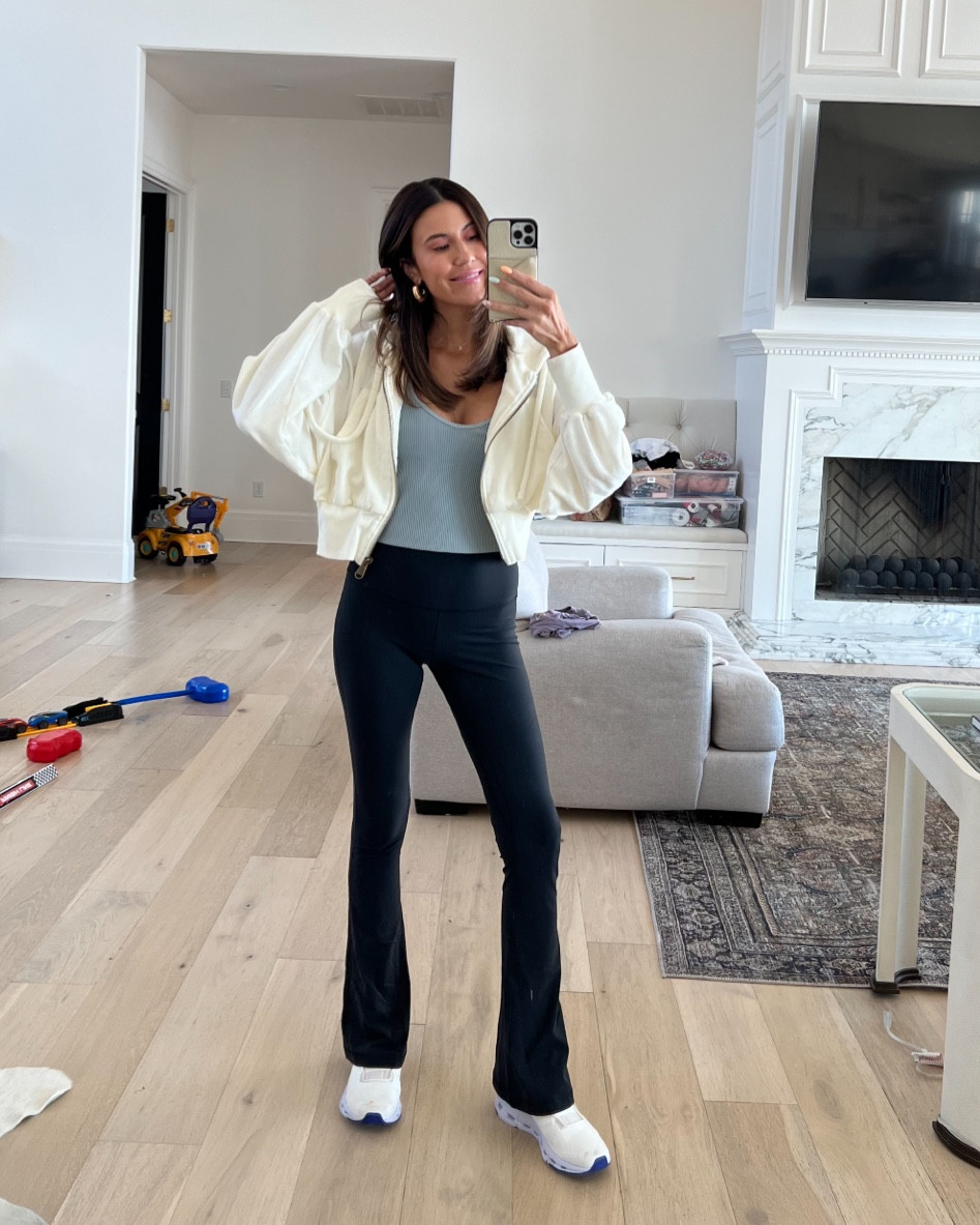 Workout look 🤍 I love these black lululemon mini flare pants - the fit is so good! I have this free people cropped zip up hoodie in multiple colors, it’s the perfect lightweight jacket for spring. These Vuori workout tops are soooo soft, I love them for the gym! 

Workout outfit; gym outfit; athleisure style; mom outfit; school drop off outfit; free people; Vuori; lululemon; oncloud sneakers; Christine Andrew 

#LTKfit #LTKshoecrush #LTKstyletip