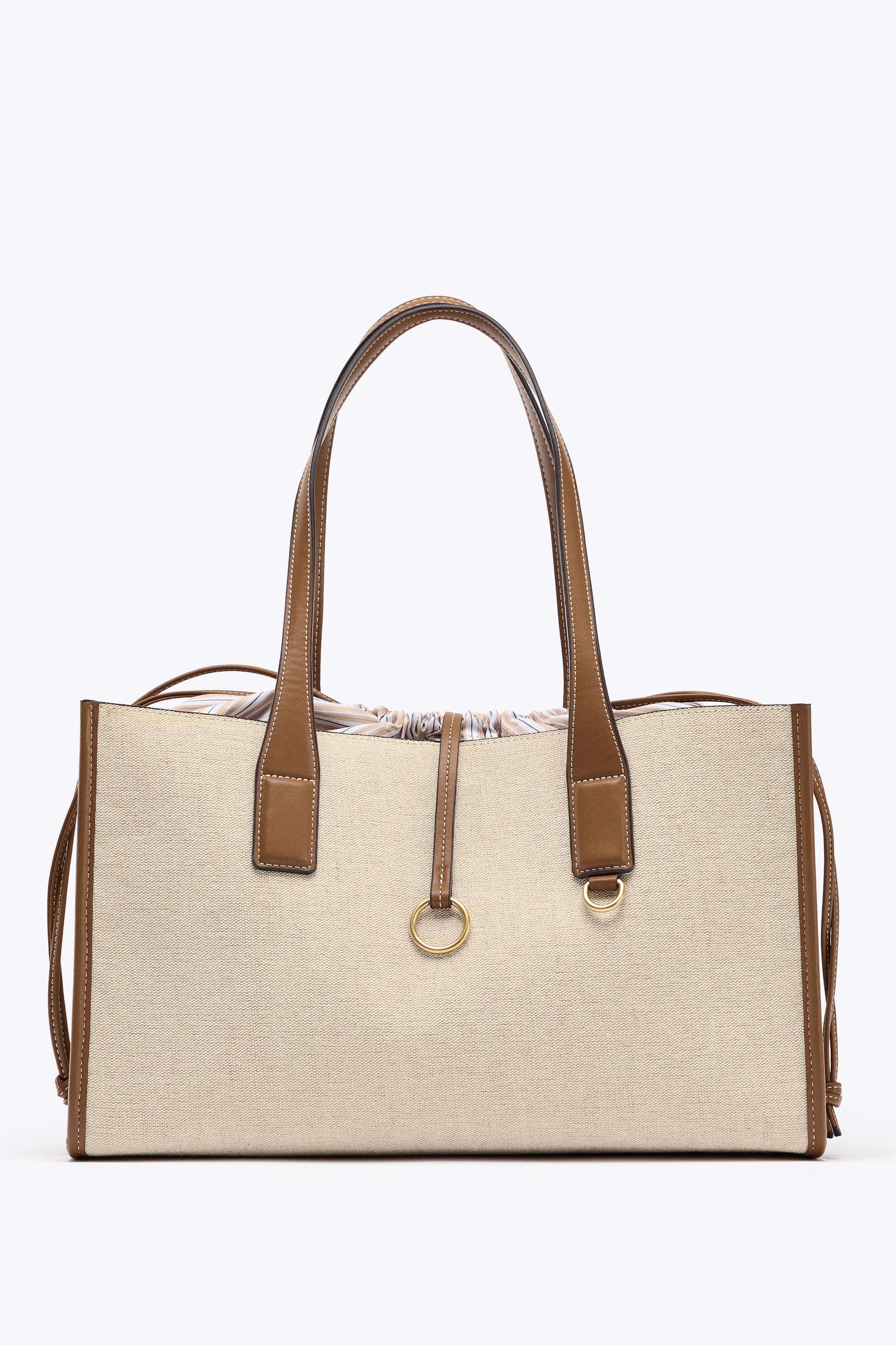 MAXI CANVAS TOTE BAG$ 75.90Ecru | 6030/610/719Add to cartAddEdit+ $ 4.00Maxi canvas tote bag. Dou... | Zara US