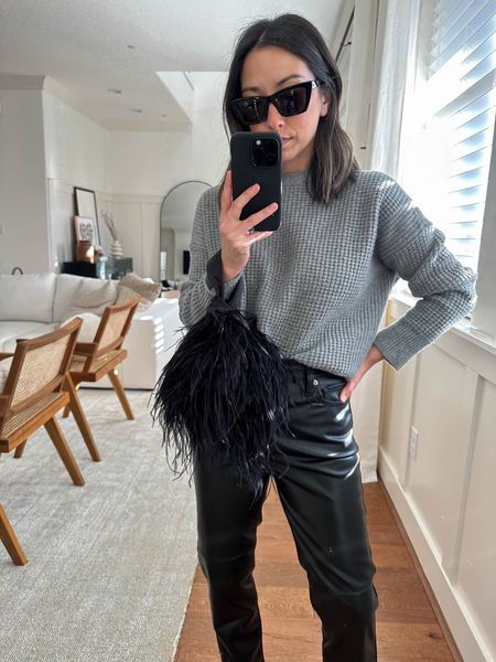 Festive outfit ideas. Holiday outfit ideas. Love wearing faux leather this time of year and these are so soft. 

Sweater - Eileen Fisher xs (old)
Pants - Gap petite 25
Bag. J.Crew 
Sunglasses - YSL 