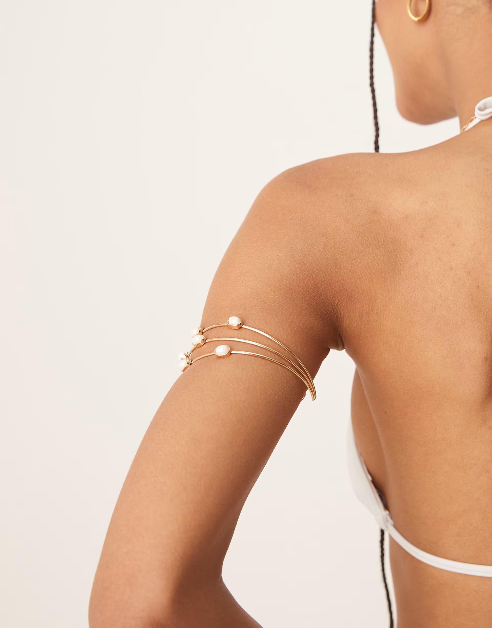ASOS DESIGN arm cuff with faux pearl row design in gold tone | ASOS (Global)