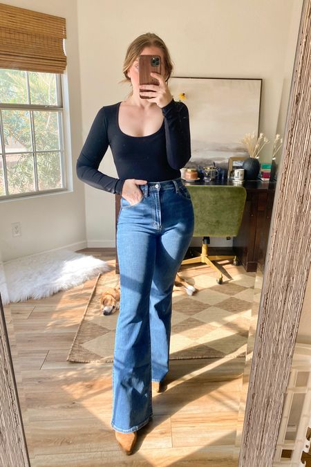 Abercrombie stretch flare jeans. Flare jeans. Black bodysuit.

Wearing my normal 26, but reg length for boots.

Very soft and stretchy but holds you in. 


#LTKSeasonal #LTKsalealert #LTKBacktoSchool