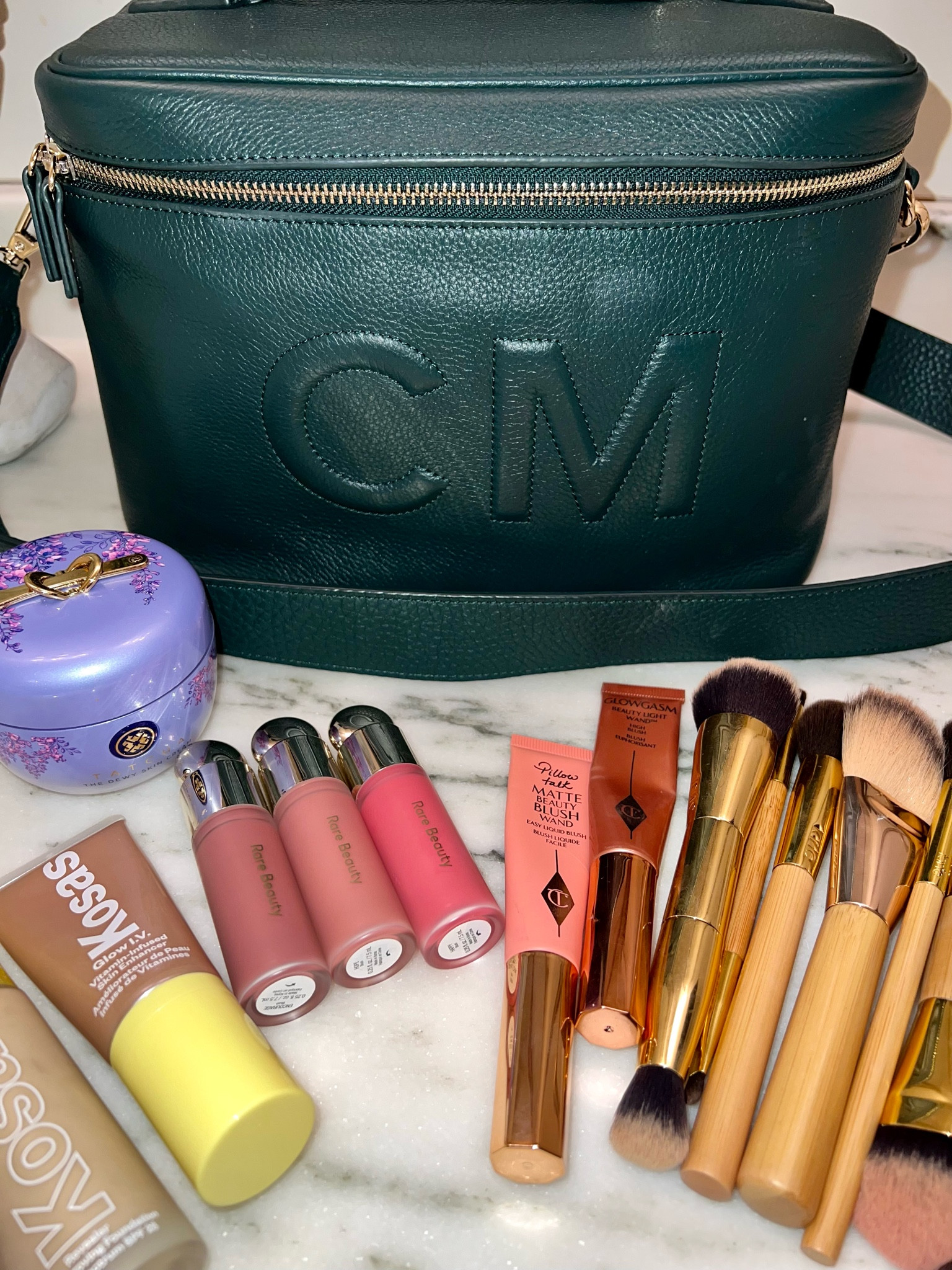 Just wanted to share a few of my recent favorite cosmetic products! 💓

1. BLUSHES! Blush has always been one of my favorite makeup products and I’ve expanded my collection lately. I received the new @charlottetilbury matte blush and I’m legit obsessed. I already had the glow one and this one is so much more my style. Gives good color payoff and seems to last all day! I also love the @rarebeauty ones. The TINIEST dab goes such a long way and so many great colors!
2. Just got these new @tartecosmetics makeup brushes on major sale and I looove them. It was time for me to get some new ones and theirs are such good quality and price point. PS Tarte is having 30% off right now!! 
3. Tried the new @kosas glow IV and I like it a lot! I mix it with my sunscreen as a glowy primer or with their foundation for a natural glowy base.
4. The @tatcha dewy skin moisturizer is to die for. I got the value size on sale around Christmas and it’s seriously the BEST primer for glowy makeup. 
5. Last but certainly not least, my husband got me this new monogrammed train makeup case from @leatherology for Christmas and I have never been so happy with a makeup bag in my life. Got the matching strap for bringing with me to do my makeup on the go, so great for travel and holds ALLLLL my goodies!

#LTKitbag #LTKbeauty #LTKSale