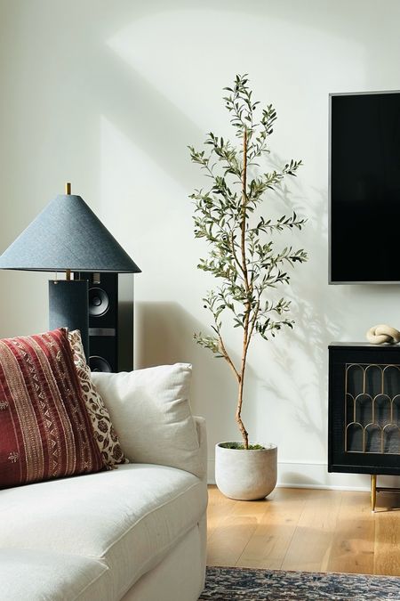 Living room decor with faux olive tree and cozy accents 💕

#LTKxPrime #LTKhome #LTKstyletip