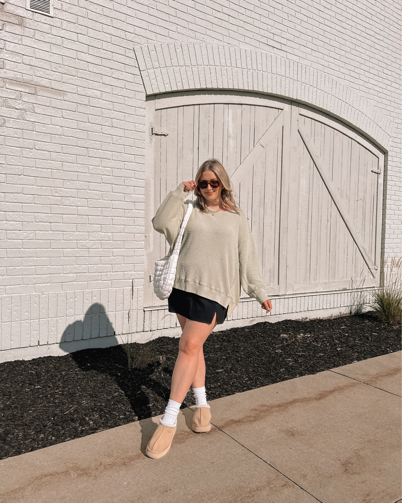 Comfy midsize fall outfit - oversized sweatshirt (L), black mini skirt (linked similar), Ugg tazz platforms (if between sizes go with your larger size), Amazon puffer bag



#LTKmidsize #LTKautumn #LTKstyletip