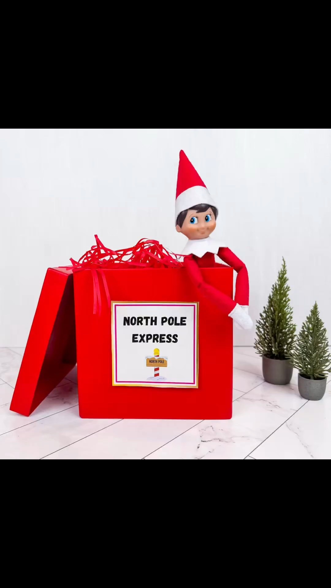 Holiday Elf arrival idea! Linked exact red box below and elf fits all the way inside with lid closed 

NOTE: Box comes with shredded red paper and lid - but sign is one of my printables that I cut out and added 

#ltkfindsunder50 #ltksalealert

#LTKKids #LTKHoliday #LTKHome