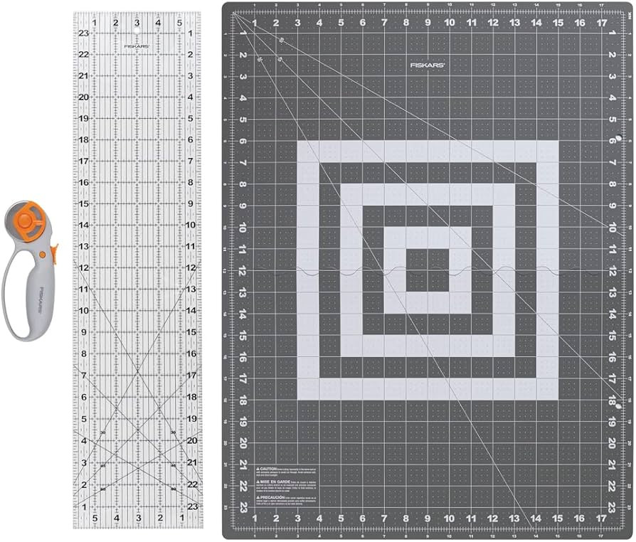 Fiskars 3 Piece Rotary Cutter Set, 45 mm Blade Rotary Fabric Cutter, Fabric Cutting Mat, Ruler fo... | Amazon (US)