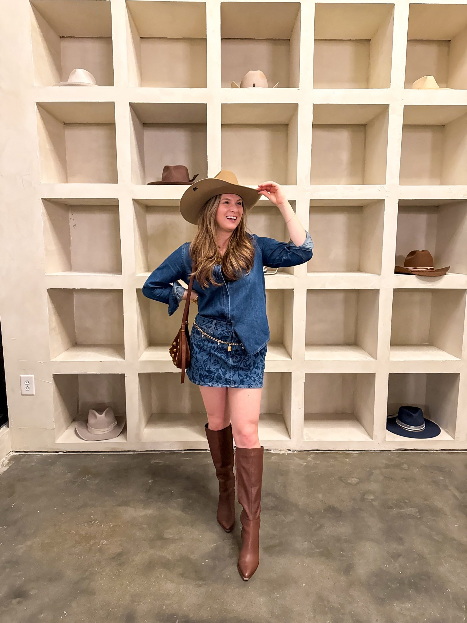 Nashville outfit all denim outfit! Denim skirt from Abercrombie with a zipper denim top 

Brown leather boots outfit dolce vita boots 
@Target  chain gold belt - goes with everything! 

@Ruti denim top with zipper - size up as it runs small! Wearing a 6 

@gigipip is now open in Nashville - the best custom cowboy hats! 

@abercrombie denim skirt 