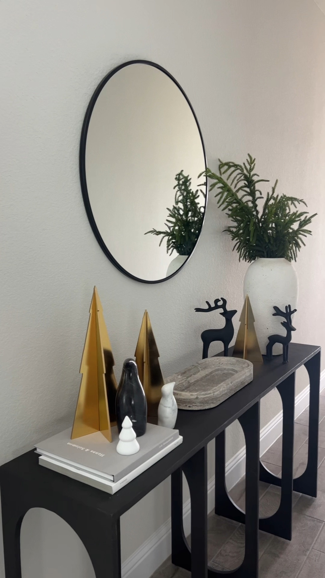 Decorate my entry way foyer table with Christmas decor for the holidays! I love a good minimal holiday decor moment and I added some color with the gold this year! 

Neutral Christmas decor, neutral home decor, holiday decor, minimal Christmas decor 

#LTKhome #LTKSeasonal #LTKHoliday