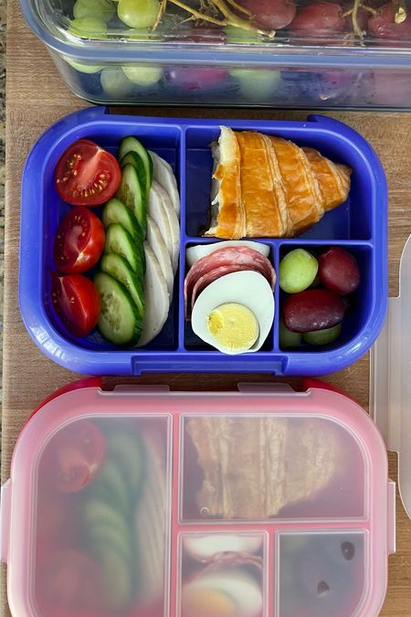 Save time by packing lunches in advance! We use these chilled bento lunchboxes to pack our kids lunch in, and I save time by packing the extra spare lunch trays at the same time I’m prepping meals or packing the current days lunch. Also pictured- produce boxes that help our fruits grapes and berries last longer. Fresh cut fruits can even be stored in these clear produce storage containers for the fridge  

#LTKhome #LTKkids #LTKfamily