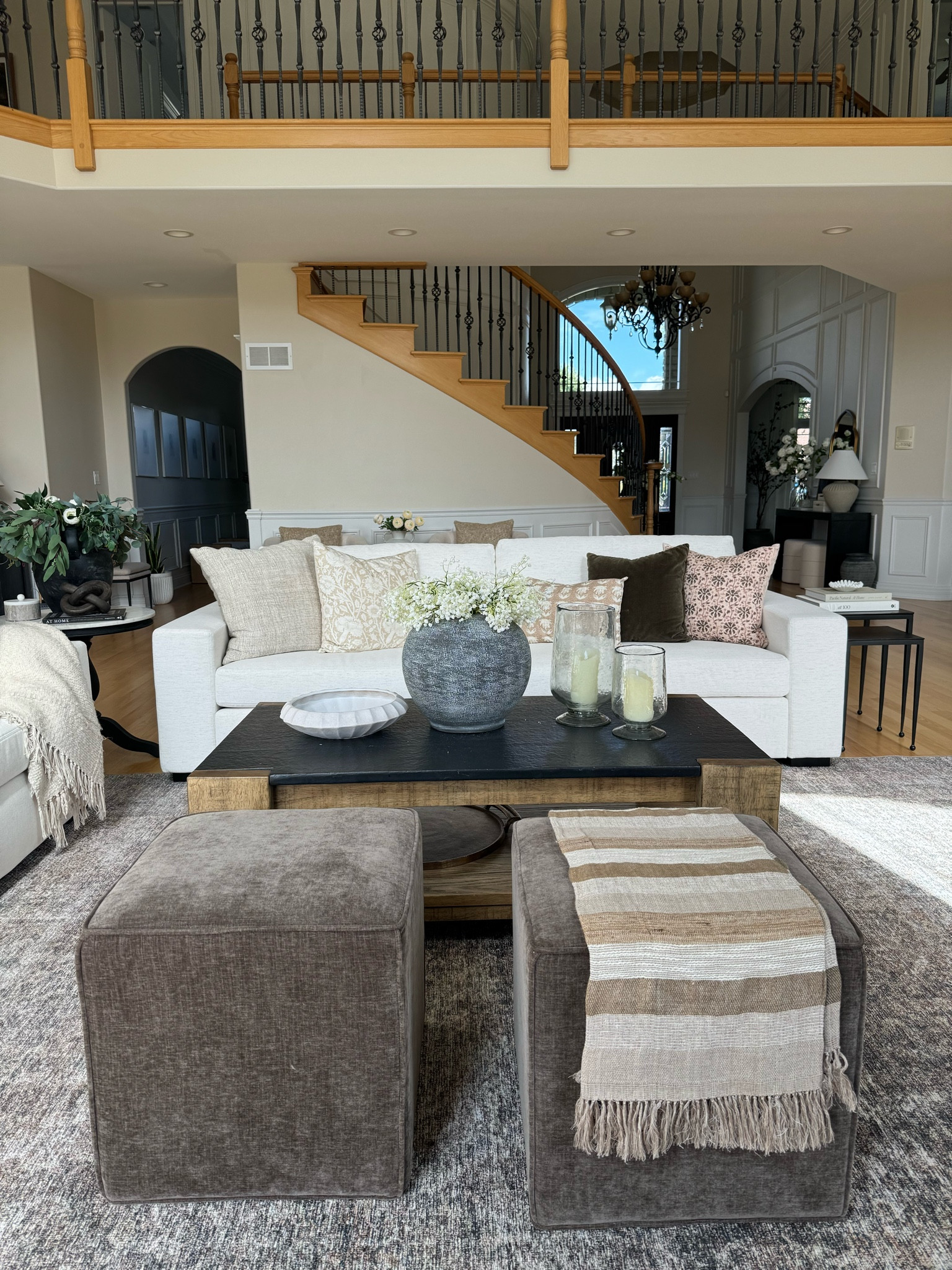Great Room view and coffee table styling! Still obsessed with these ottomans from Studio McGee. 

Great room, ottoman, cube, coffee table, sofa, white sofa, throw pillow, throw pillow, coffee table decor, great room, vase, florals, living room decor, living room styling, sofa, 

#LTKSaleAlert #LTKHome #LTKStyleTip