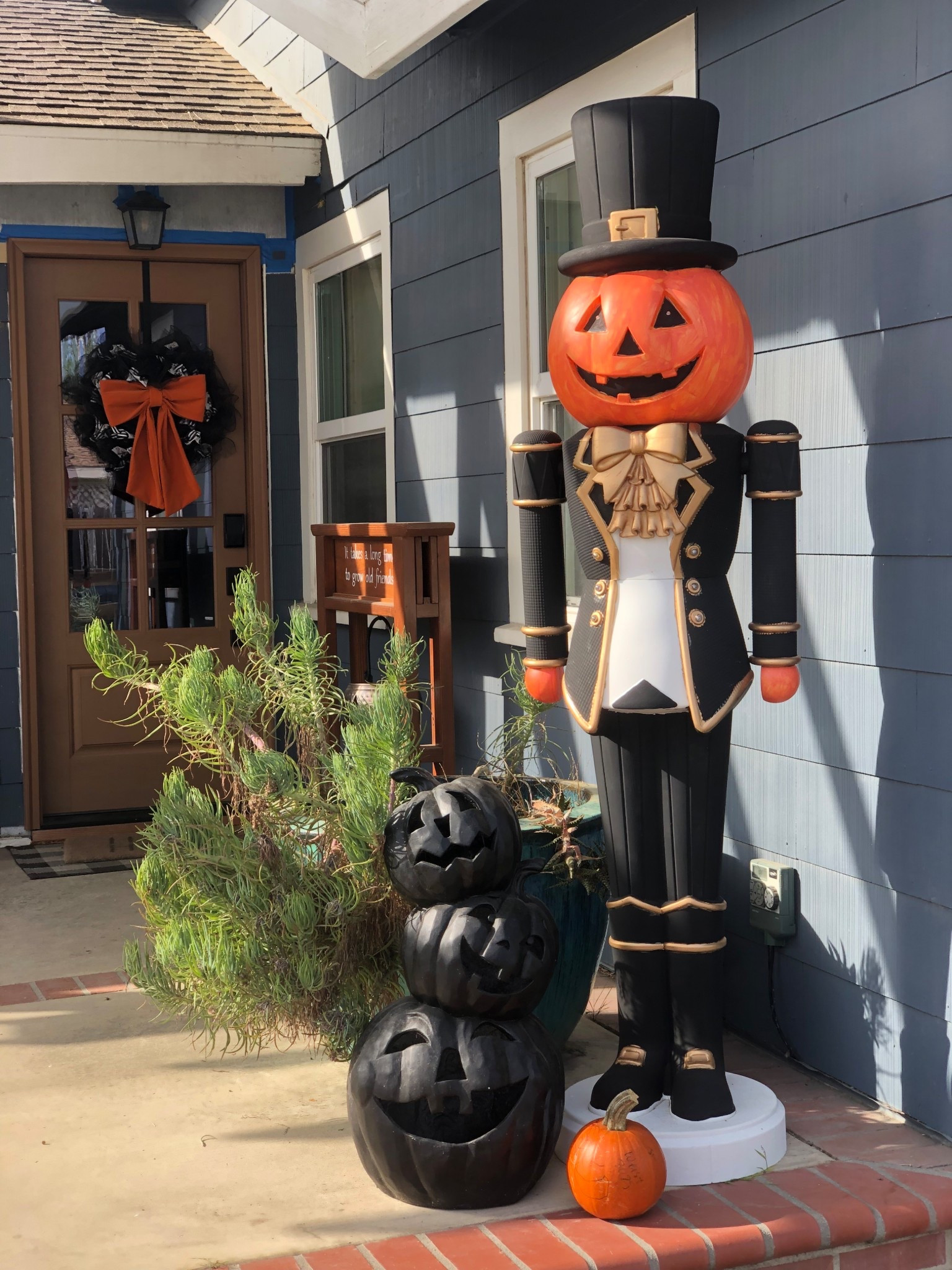 Walmart Pumpkin Nutcracker - I finally finished it!  It’s not perfect but I’m not the most patient painter. 
Used black chalk paint for most of it, rub n buff for bow, lining and buckles and a mixture of orange acrylic paints for his face and hands.  I’m sure I’ll have to make touch ups every year I bring him out but pretty happy with the end result! 

#LTKSeasonal #LTKHalloween #LTKHome