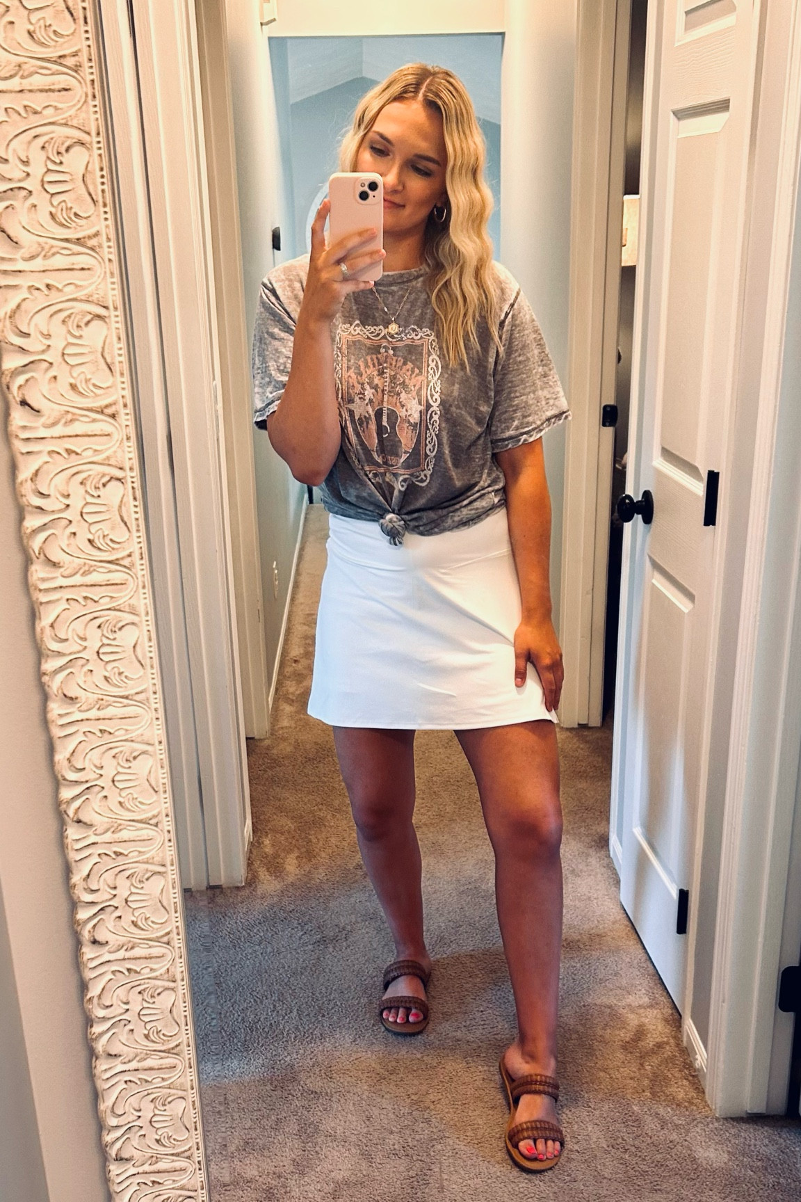 Loving this athletic skirt from Old Navy and to dress it up I added a graphic tee and sandals. 
Skirt // skort // graphic tee // summer style // summer outfit // sandals // target // old navy // 