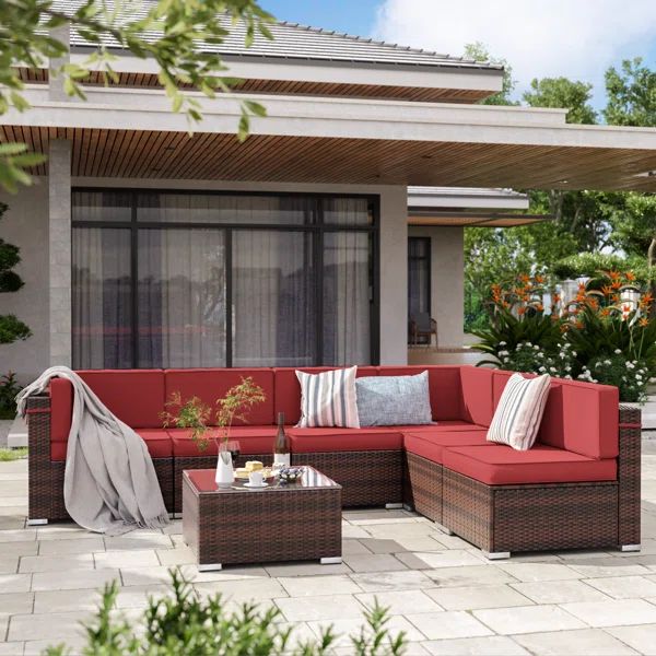 7 Piece Rattan Sectional Seating Group with Cushions | Wayfair North America