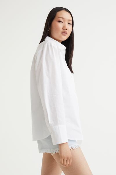 Oversized shirt in airy, woven cotton fabric. Collar, buttons at front, and yoke at back. Open ch... | H&M (US + CA)
