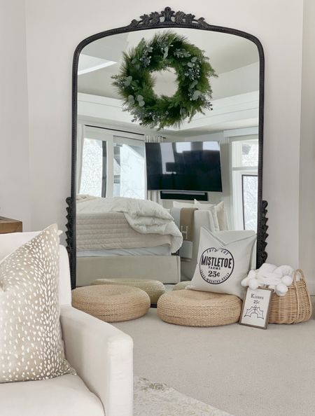 H O M E \ bedroom holiday details! Oversized floor mirror and poufs paired with a holiday wreath, pillow and sign ✨

Christmas home decor 

#LTKhome #LTKHoliday