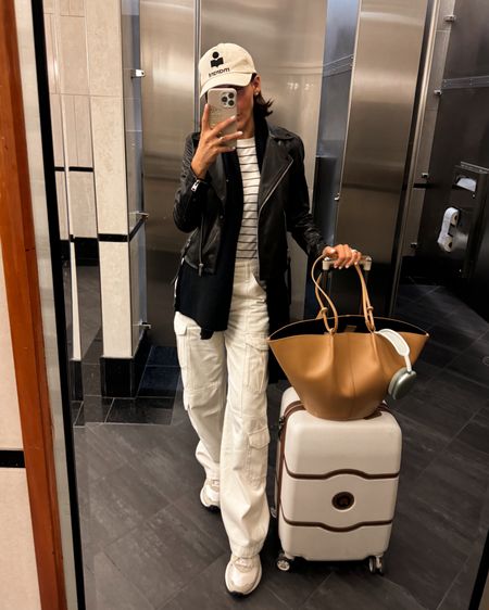 Airport outfit
Extra comfy baggy cargos fits a bit oversized, wearing my true size! 25
Chunky sneakers 
Layer cotton tee and cashmere scarf 

#LTKtravel #LTKstyletip #LTKitbag