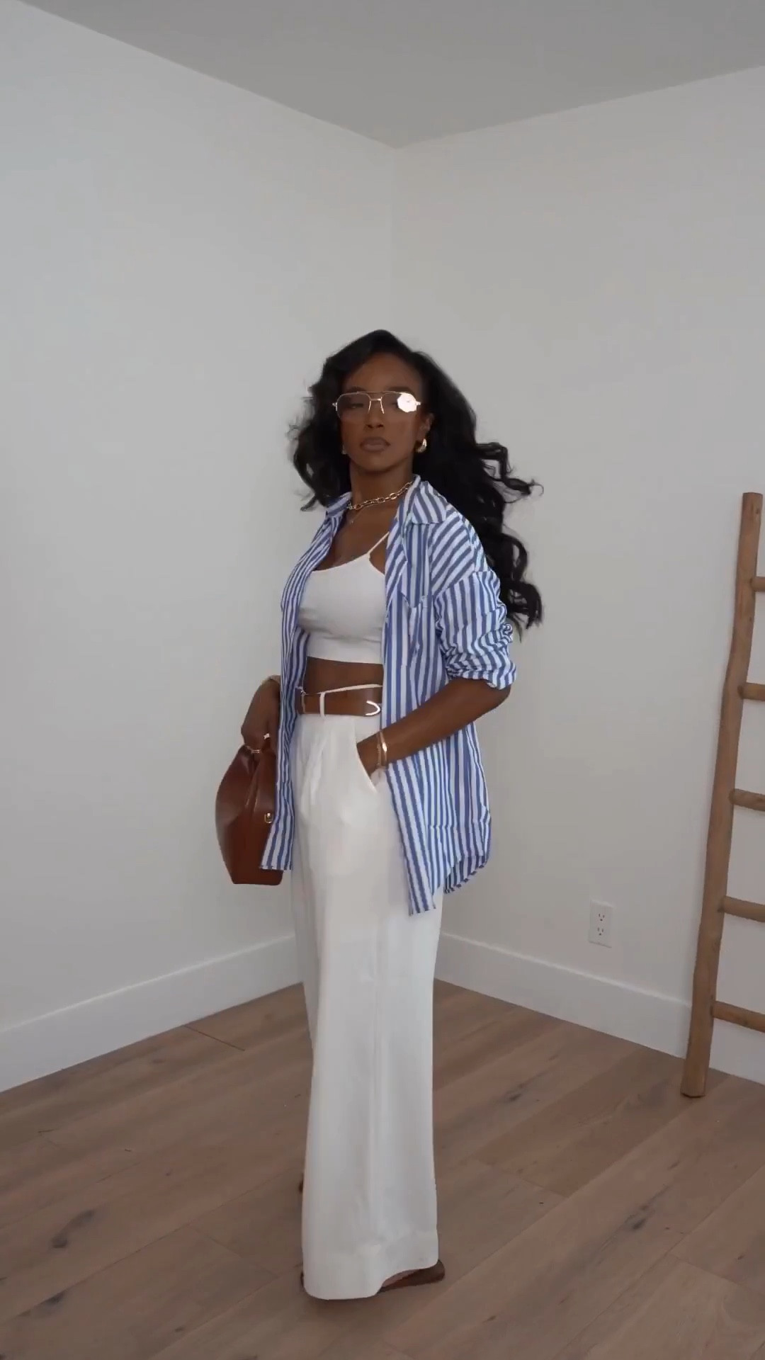 Scroll to shop this effortless spring outfit featuring wide-leg trousers and a striped button-down layered over a crop top. Perfect for vacation days, brunch, or an elevated casual look.

Measurements: 5'4", 138 lbs, 34D bust, 27" waist, 40" hips

#LTKootd #LTKSeasonal #LTKdayinmylife

#LTKvlog #LTKgrwm #LTKootd