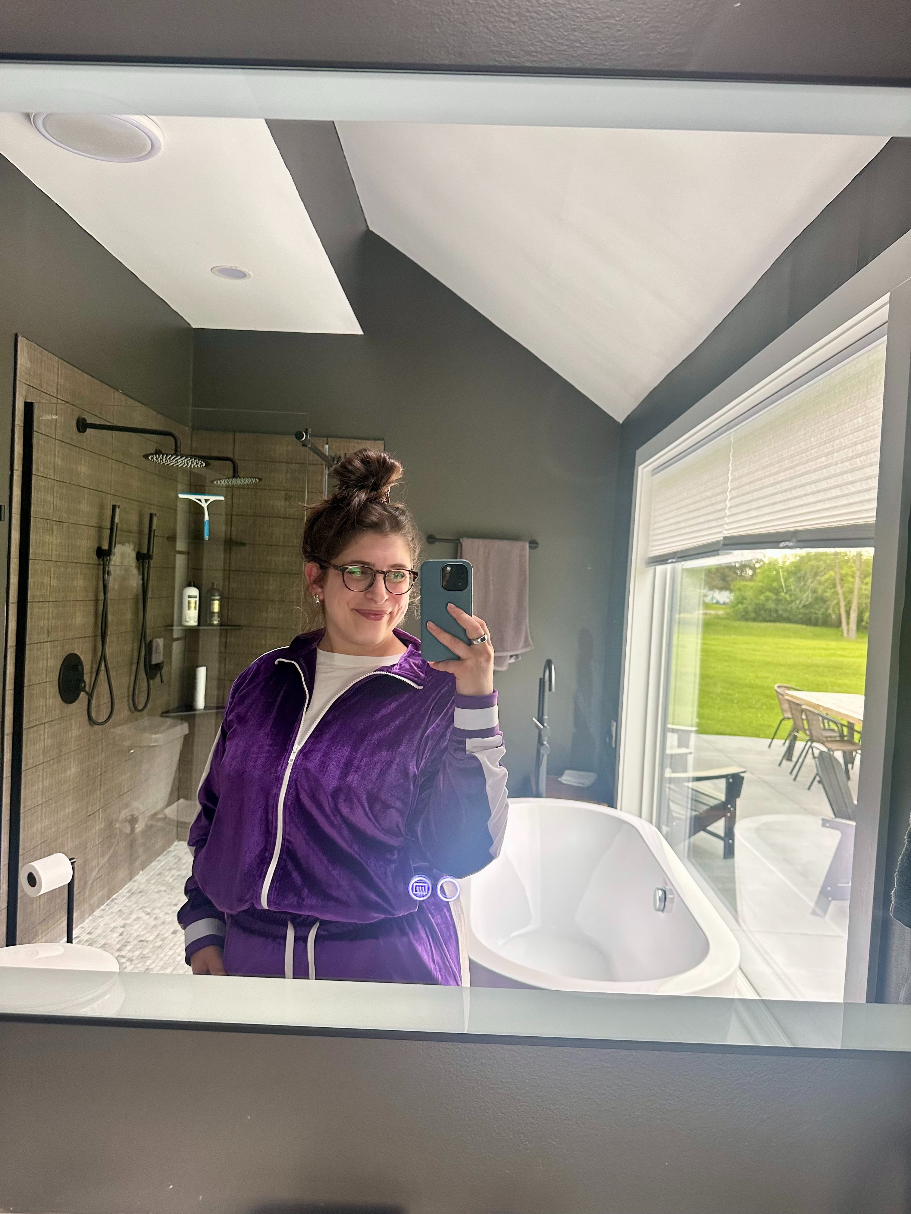 Bach outfit: purple velour tracksuit to stay comfy  

 