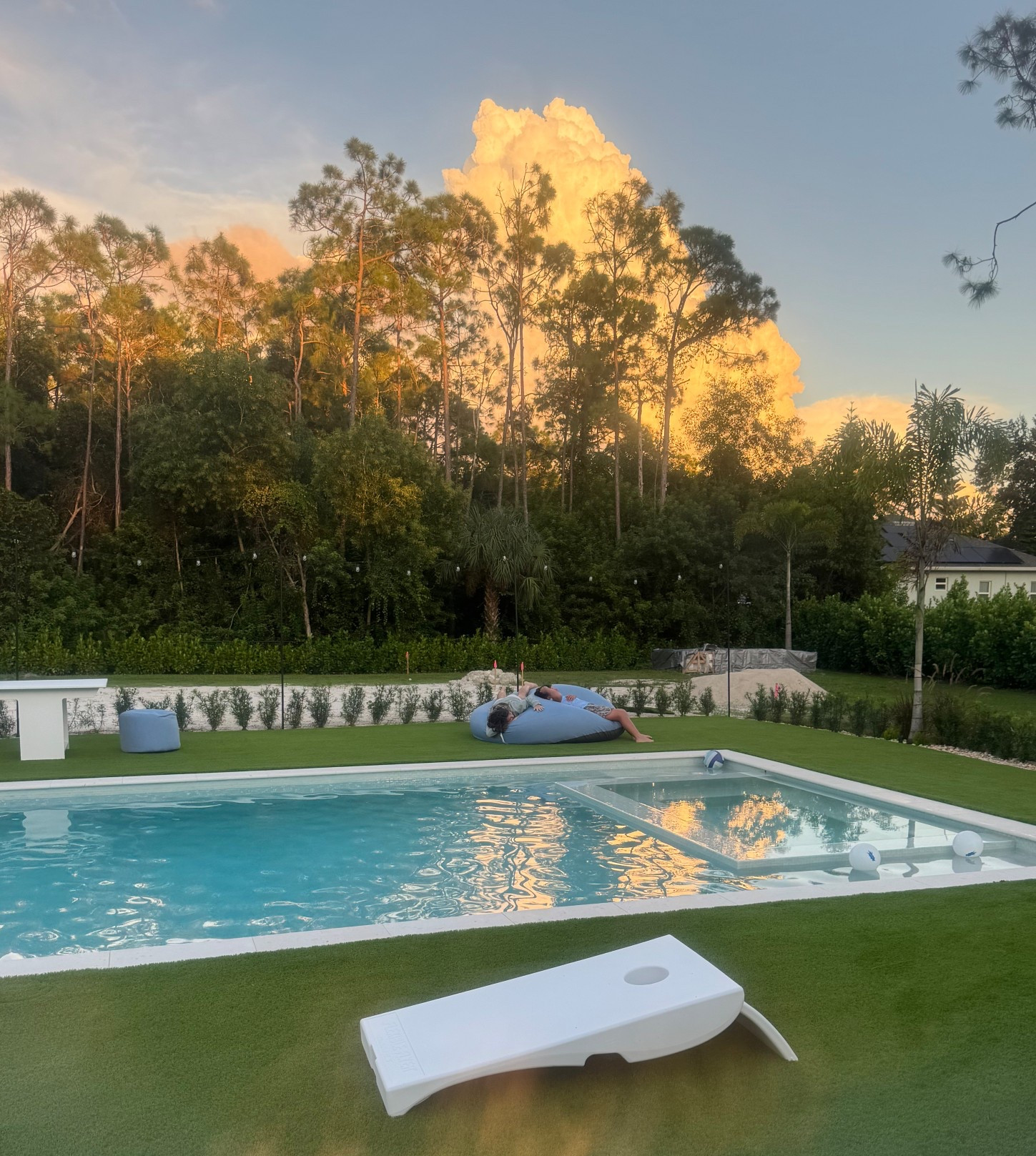 Waterproof outdoor Corn hole, it’s always ready backyard fun. Parents or friends can hang on the blue Outdoor bean bag and watch them play. We’re enjoying our new Pool build. 

#LTKSwim #LTKHome #LTKStyleTip